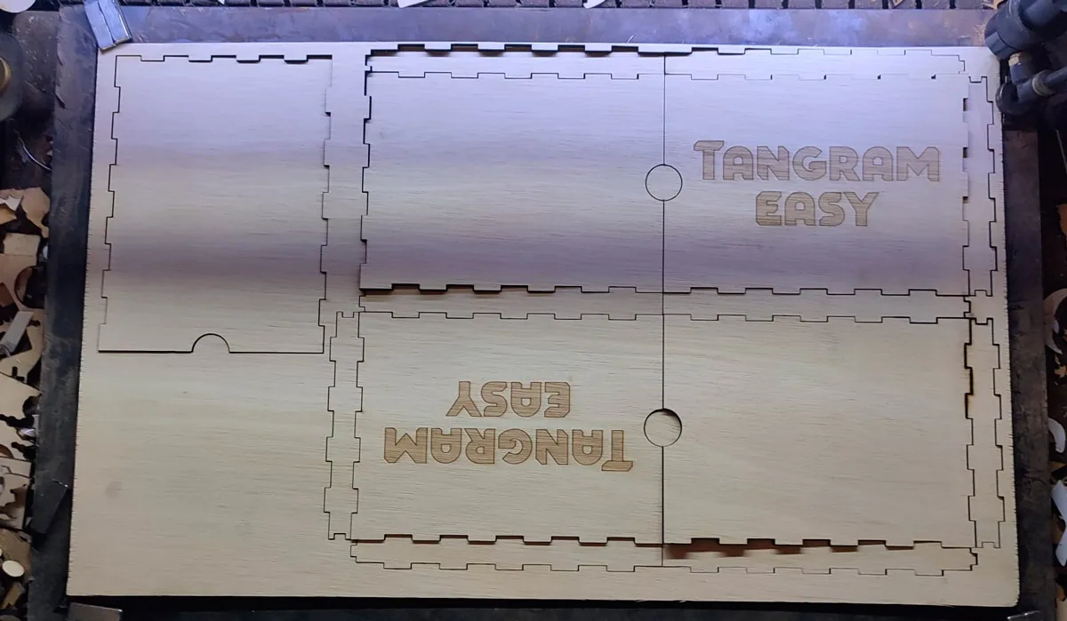 Full plywood sheet with all laser-cut Tangram Easy box parts